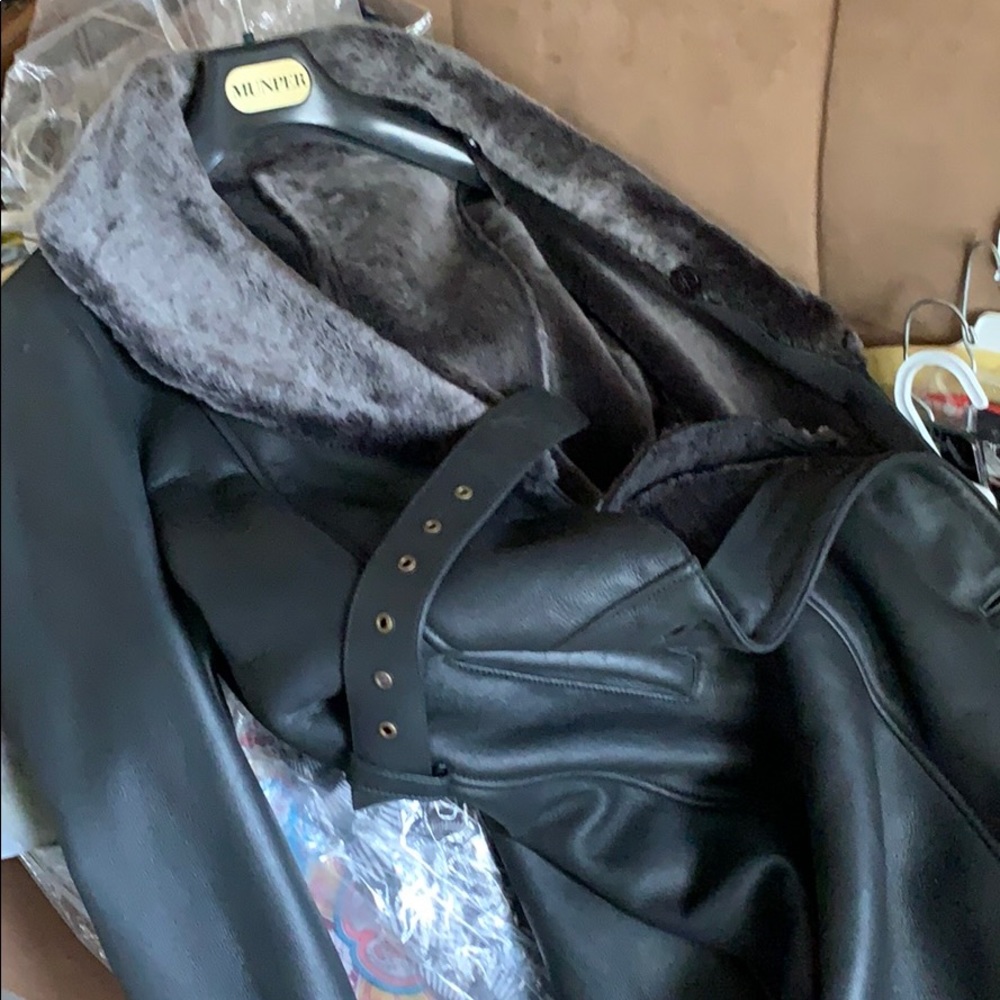 Black leather coat Euro size 44 bought in Spain